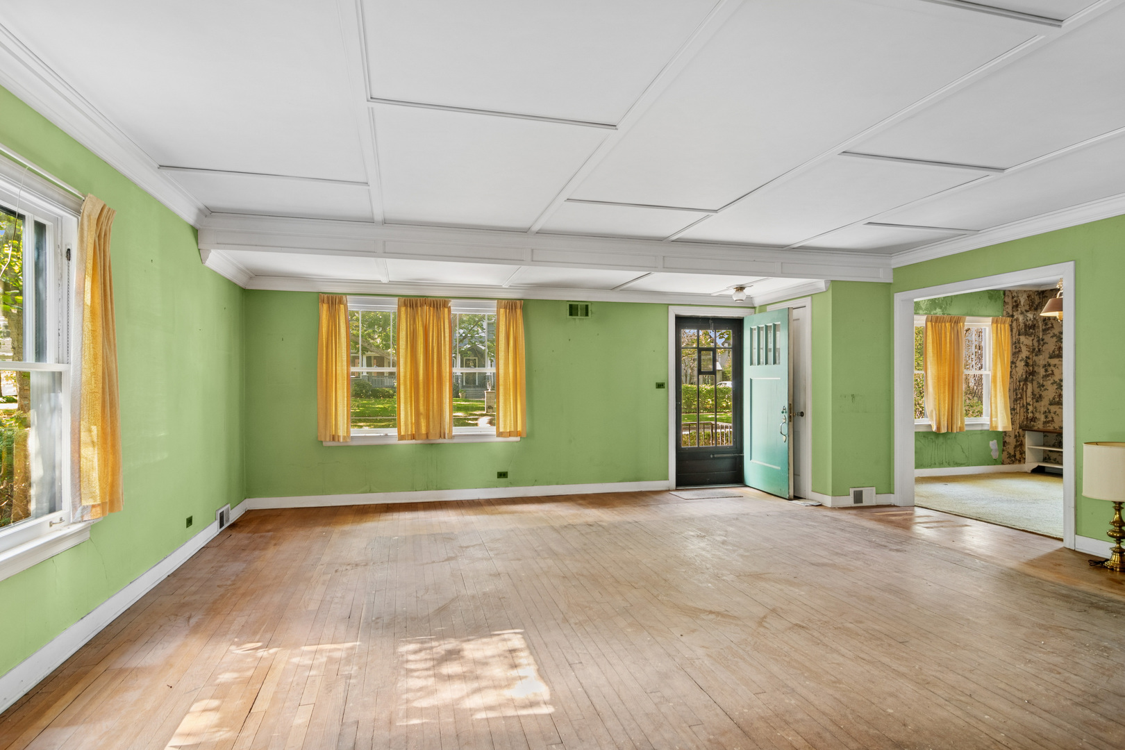 785 Locust Street Winnetka, IL 60093 - Photo 5 of 19 a view of an empty room with window and stairs