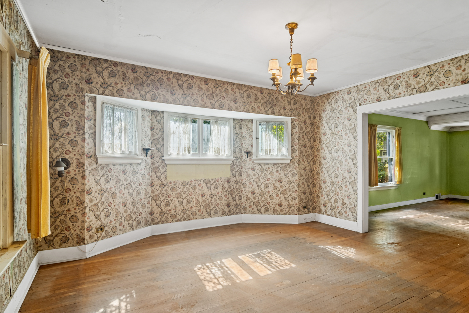 785 Locust Street Winnetka, IL 60093 - Photo 9 of 19 wooden floor in an empty room with a window