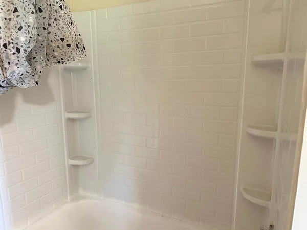 a bathroom with a bathtub