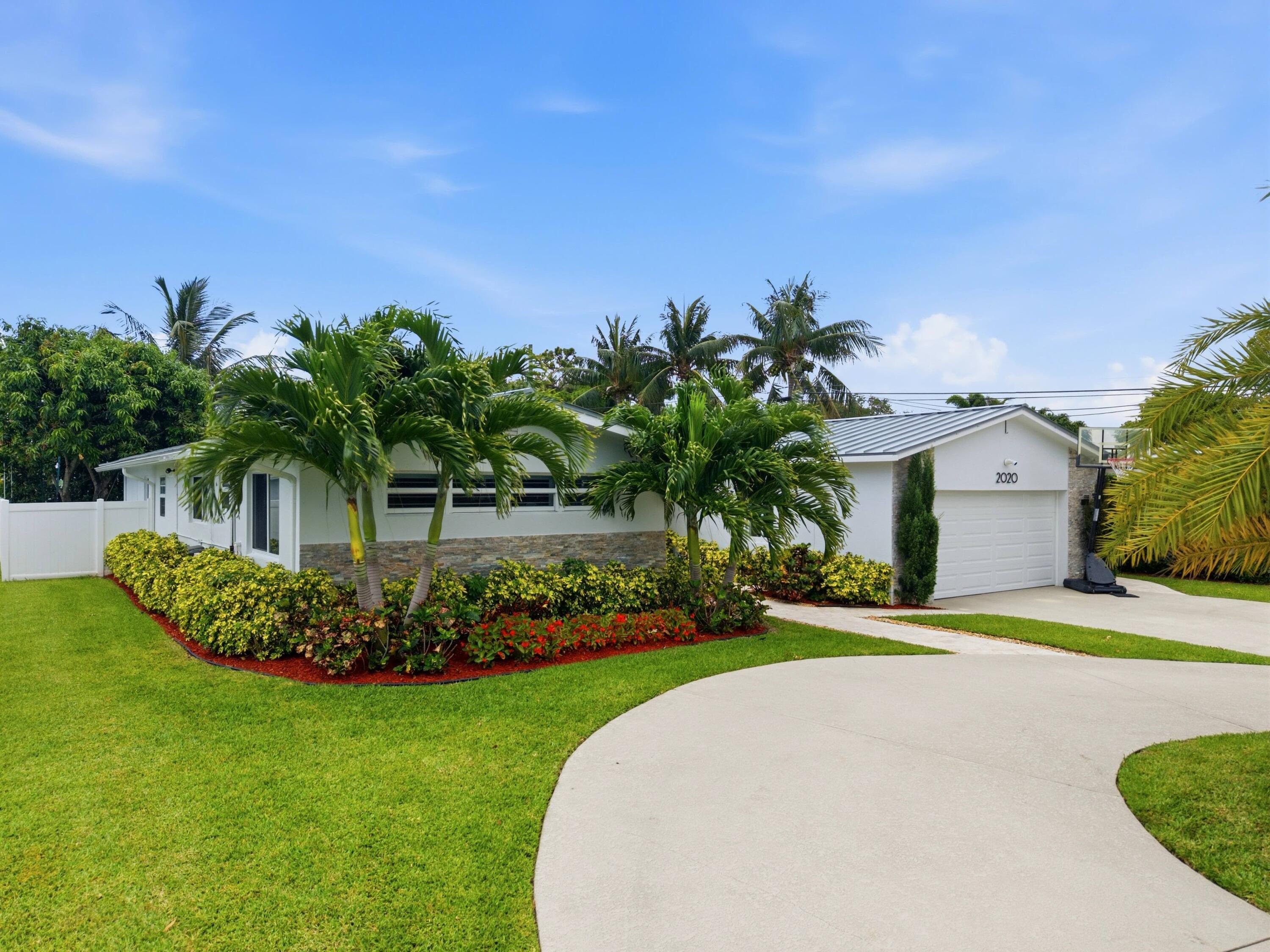 2020 Northeast 26th Street Lighthouse Point, FL 33064 - Photo 3 of 62 Front