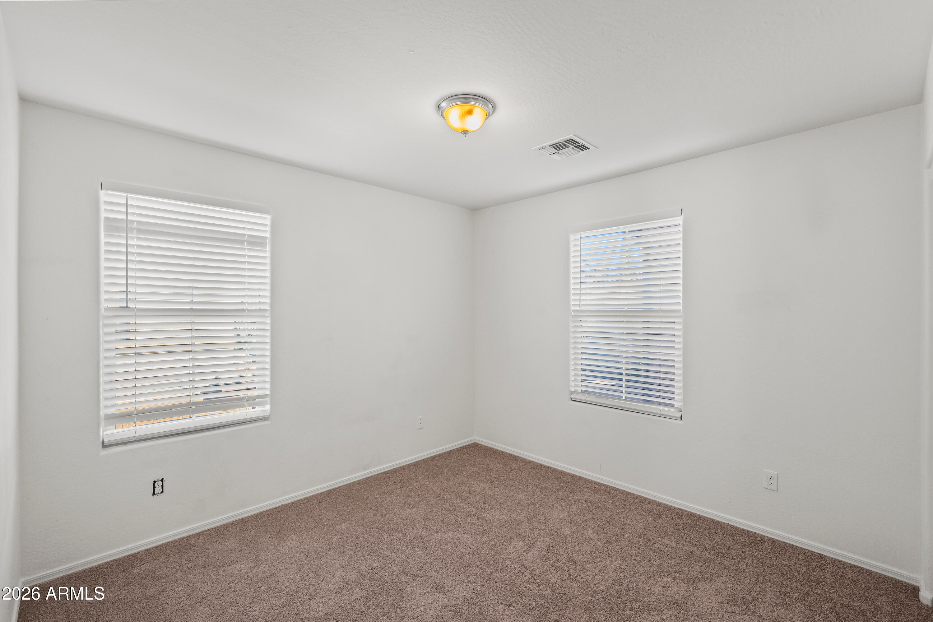 507 North Ranger Trail Gilbert, AZ 85234 - Photo 13 of 19 a view of an empty room with a window