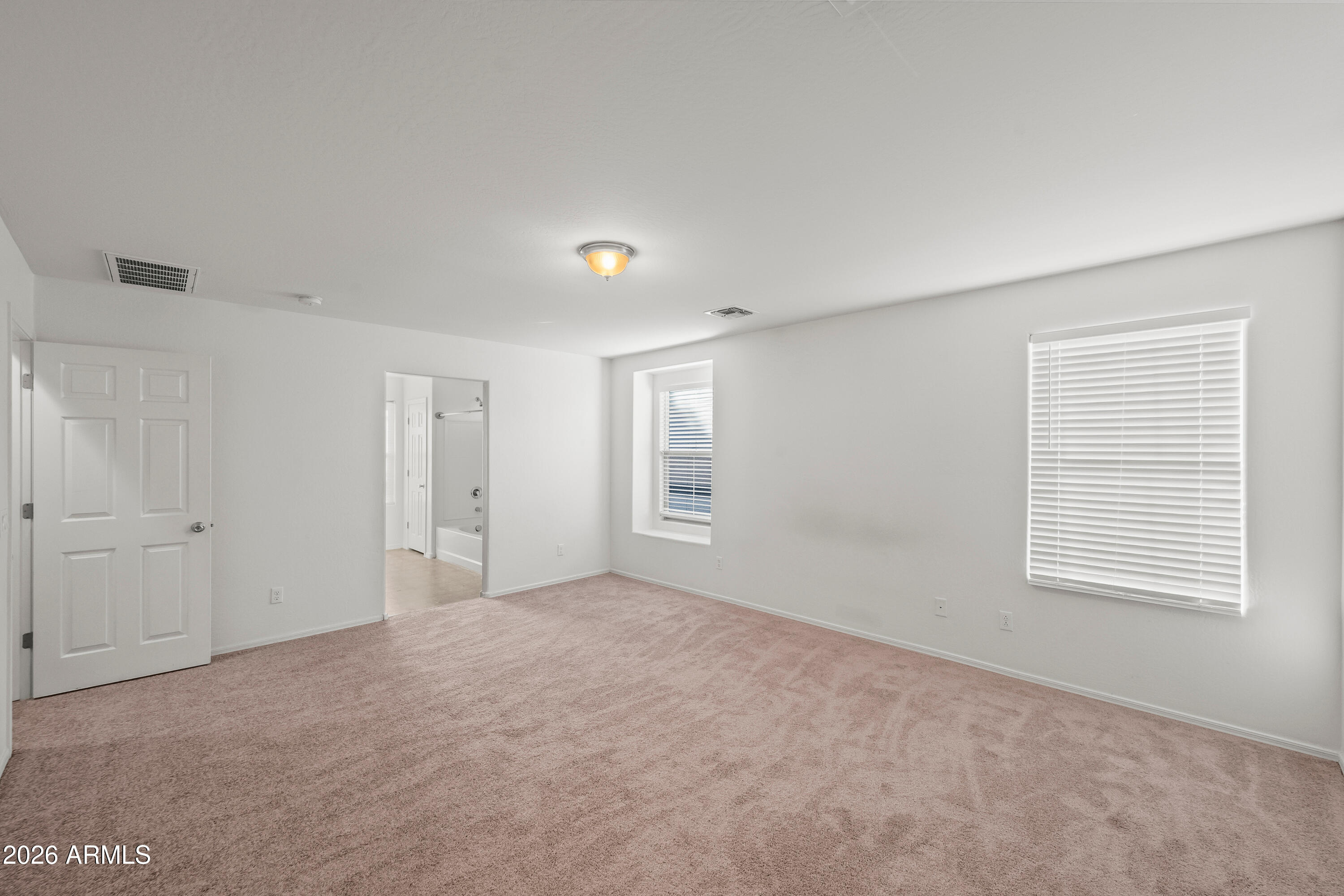 507 North Ranger Trail Gilbert, AZ 85234 - Photo 17 of 19 a view of an empty room with a window