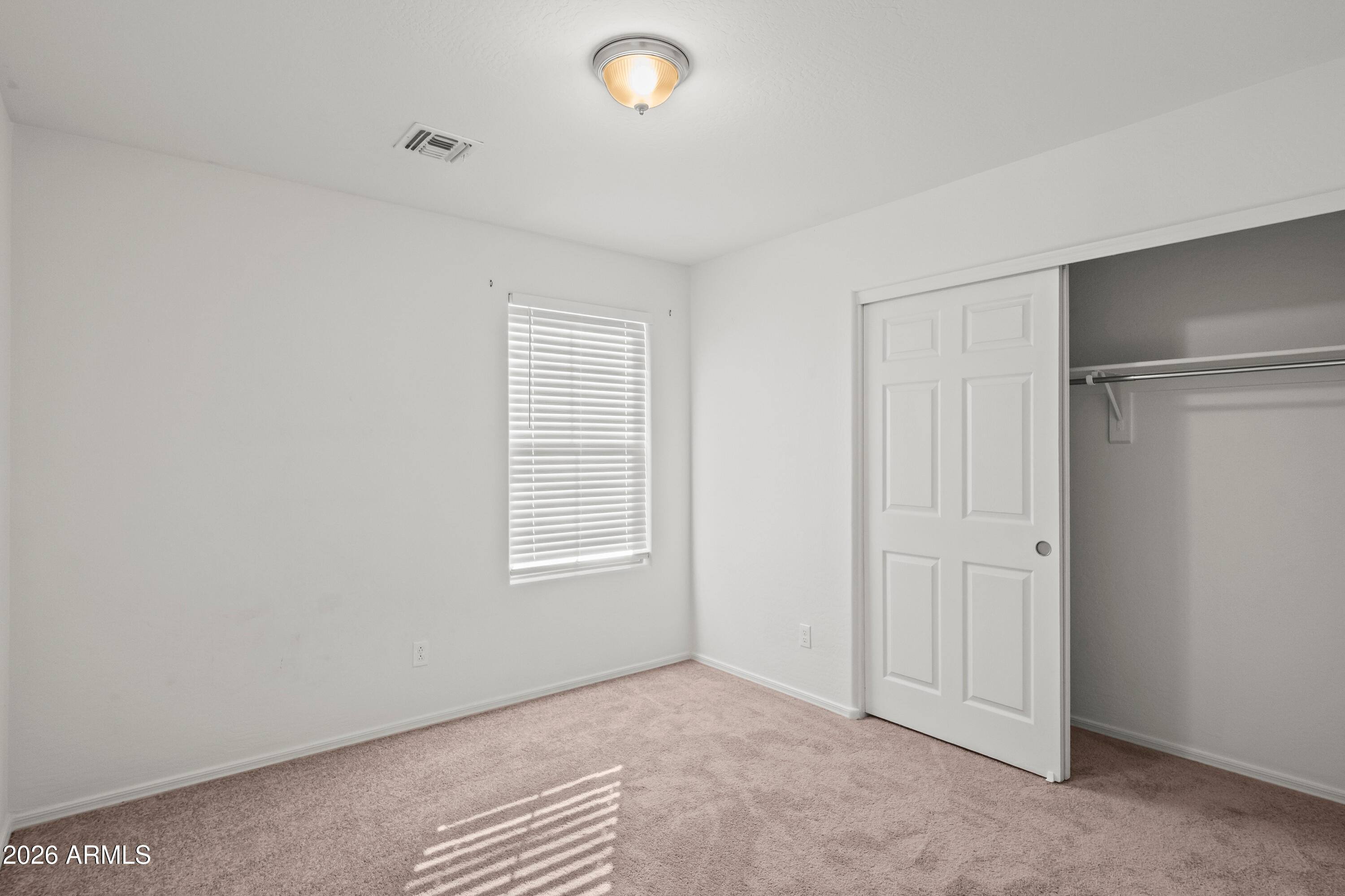 507 North Ranger Trail Gilbert, AZ 85234 - Photo 19 of 19 an empty room with windows