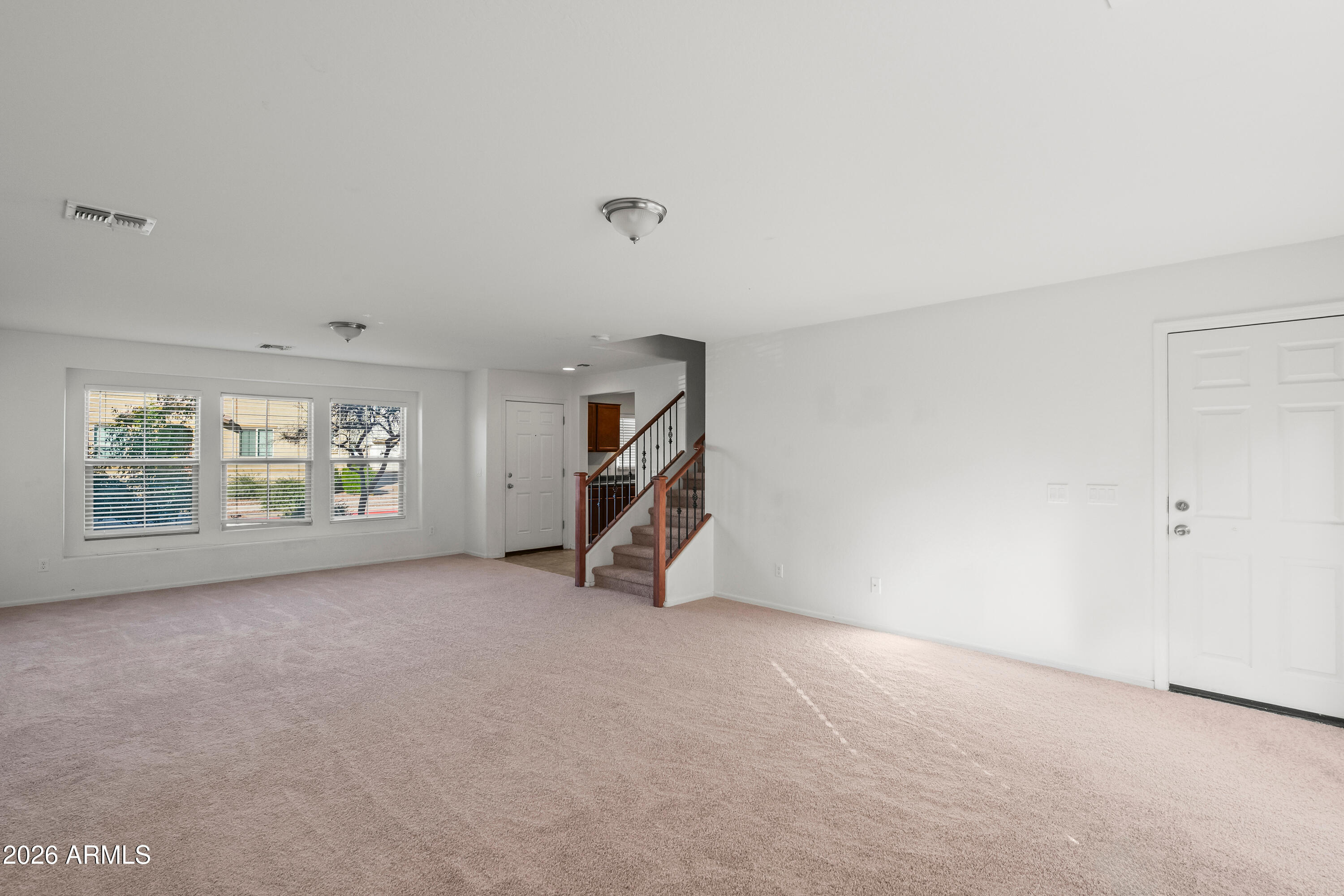 507 North Ranger Trail Gilbert, AZ 85234 - Photo 7 of 19 a view of an empty room with a window