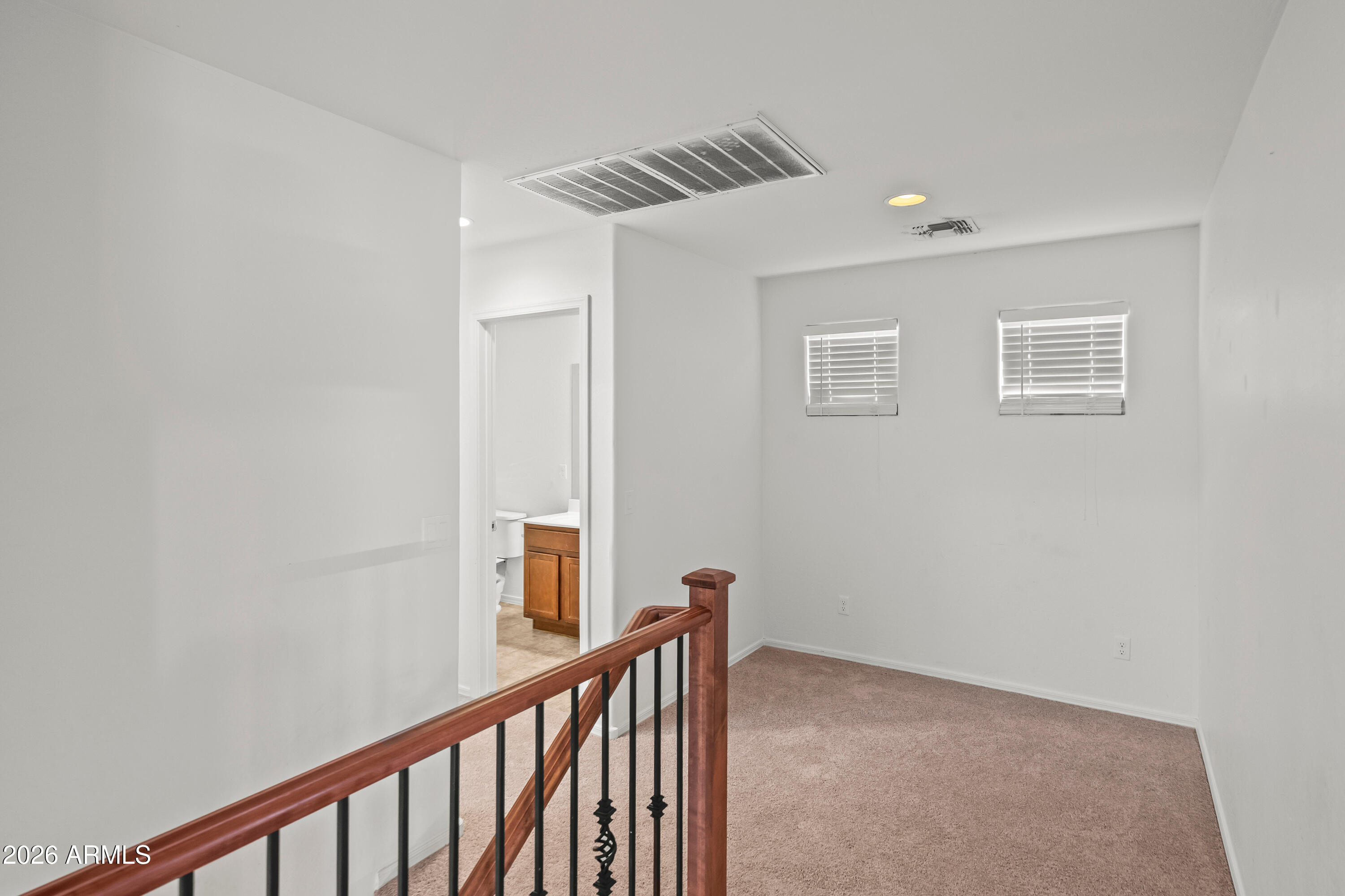 507 North Ranger Trail Gilbert, AZ 85234 - Photo 8 of 19 a view of a hallway with stairs
