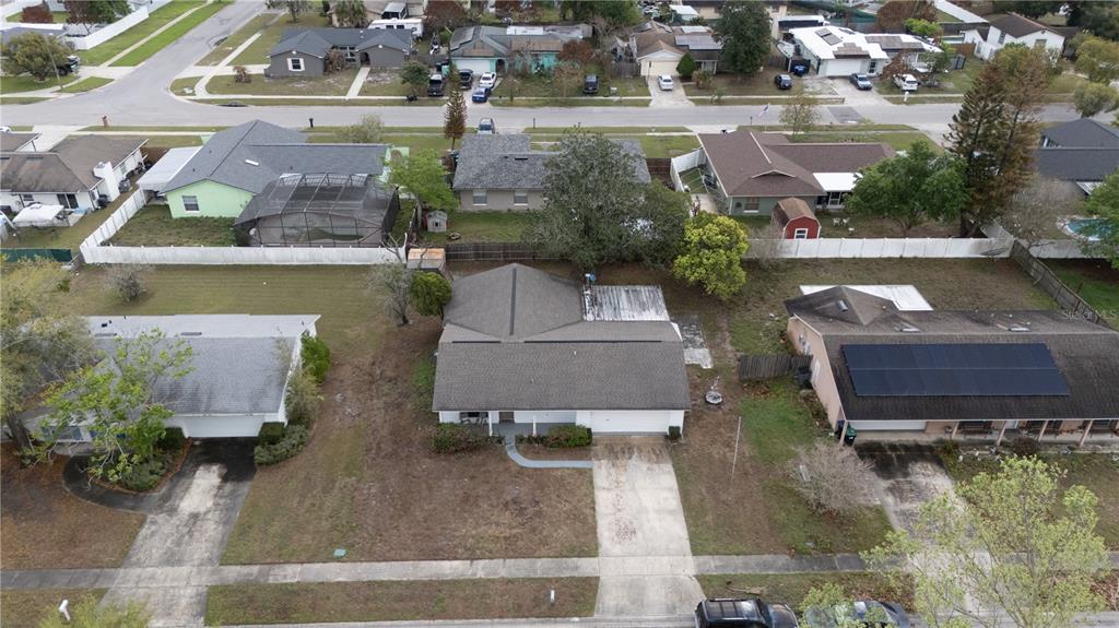 2733 Middle Street Orlando, FL 32807 - Photo 3 of 23 an aerial view of a house with a yard