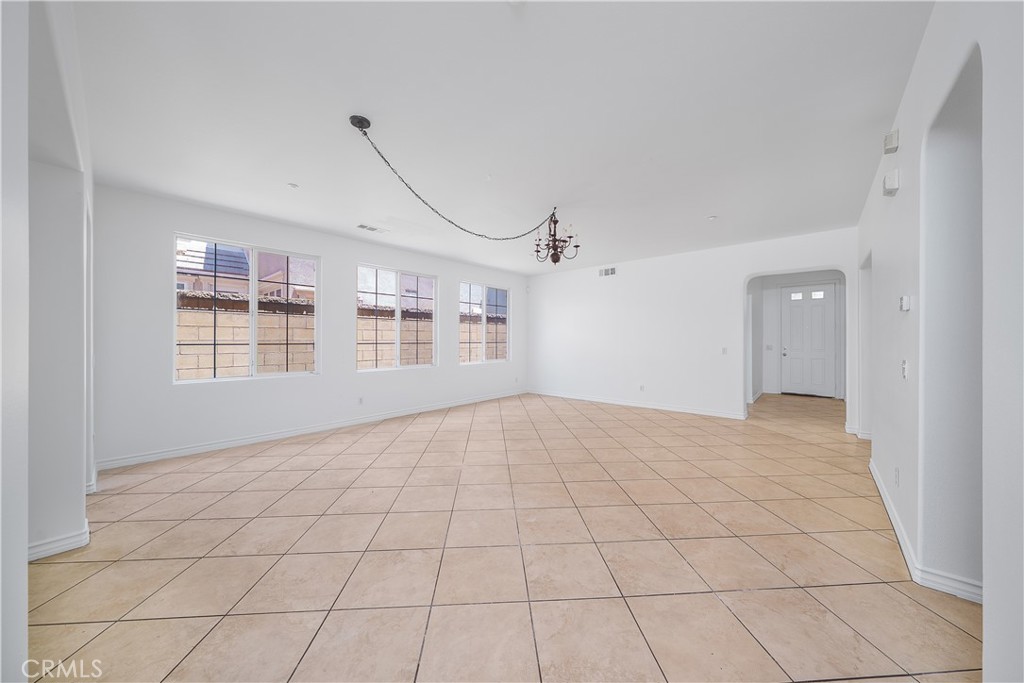 5662 Galasso Avenue Fontana, CA 92336 - Photo 4 of 34 a view of an empty room with a window