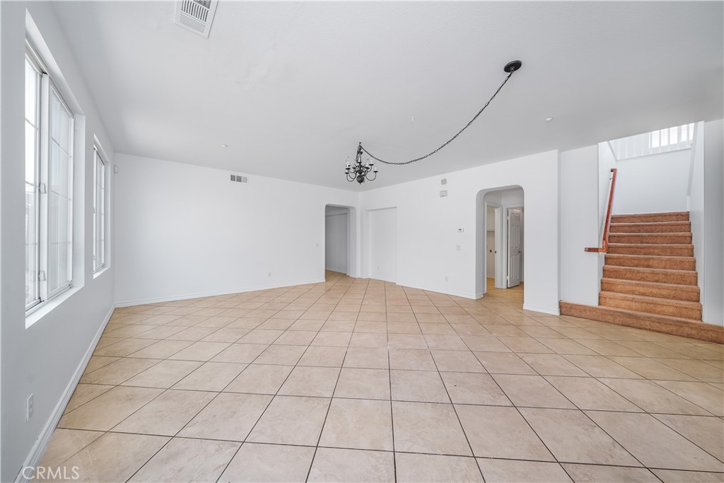 5662 Galasso Avenue Fontana, CA 92336 - Photo 7 of 34 a view of an empty room and a window