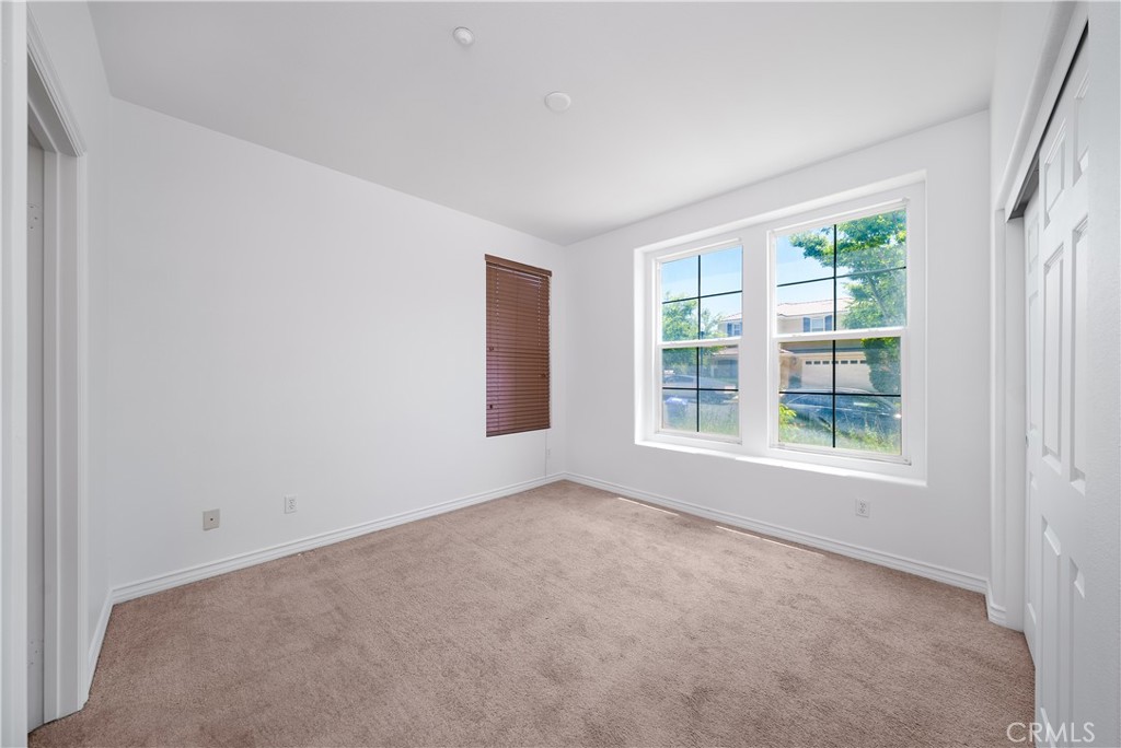 5662 Galasso Avenue Fontana, CA 92336 - Photo 8 of 34 an empty room with windows