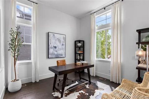 a workspace with furniture and a window