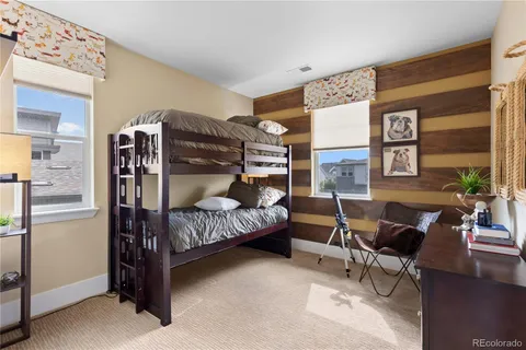 a bedroom with furniture and a bed