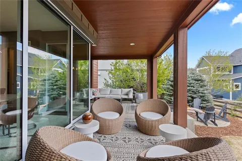 a outdoor living space with furniture and a potted plant