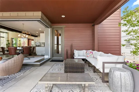 a outdoor space with patio the couches and kitchen view