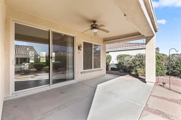 a large kitchen with stainless steel appliances granite countertop a stove sink and cabinets