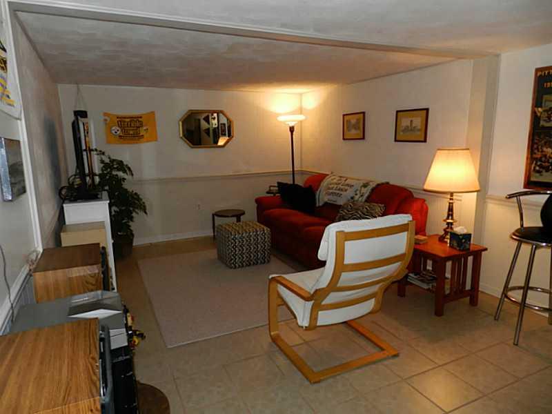 182 Castle Road Castle Shannon, PA 15234 - Photo 16 of 25 Basement/Game Room. Huge finshed game room with ceramic tile floor.