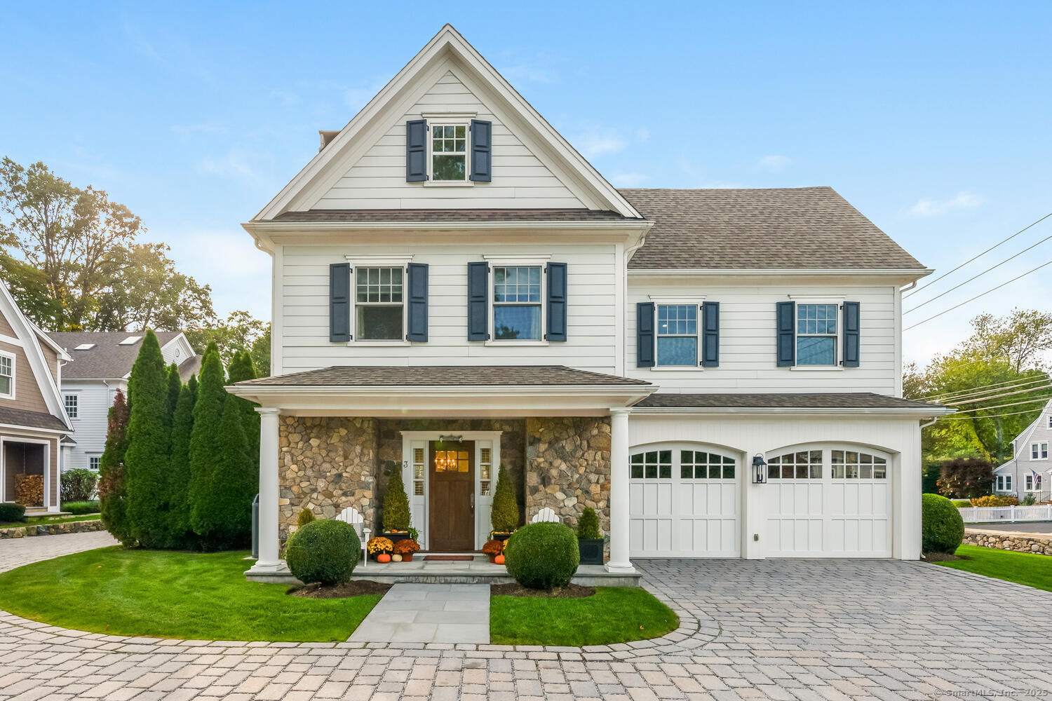 333 West Avenue, Unit 3 Darien, CT 06820 - Photo 1 of 38 a front view of a house with garden