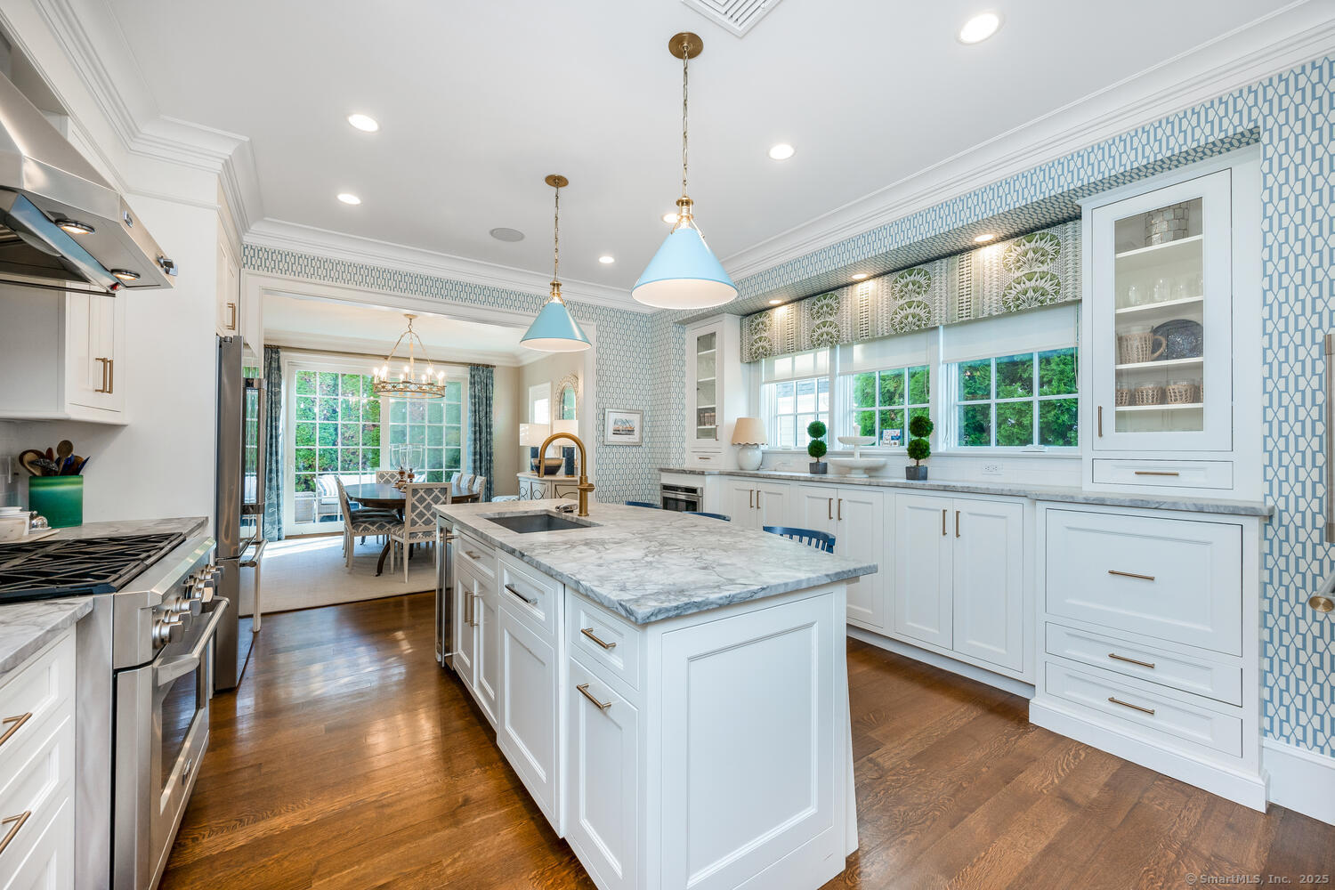 333 West Avenue, Unit 3 Darien, CT 06820 - Photo 12 of 38 a kitchen with sink stove and wooden floor
