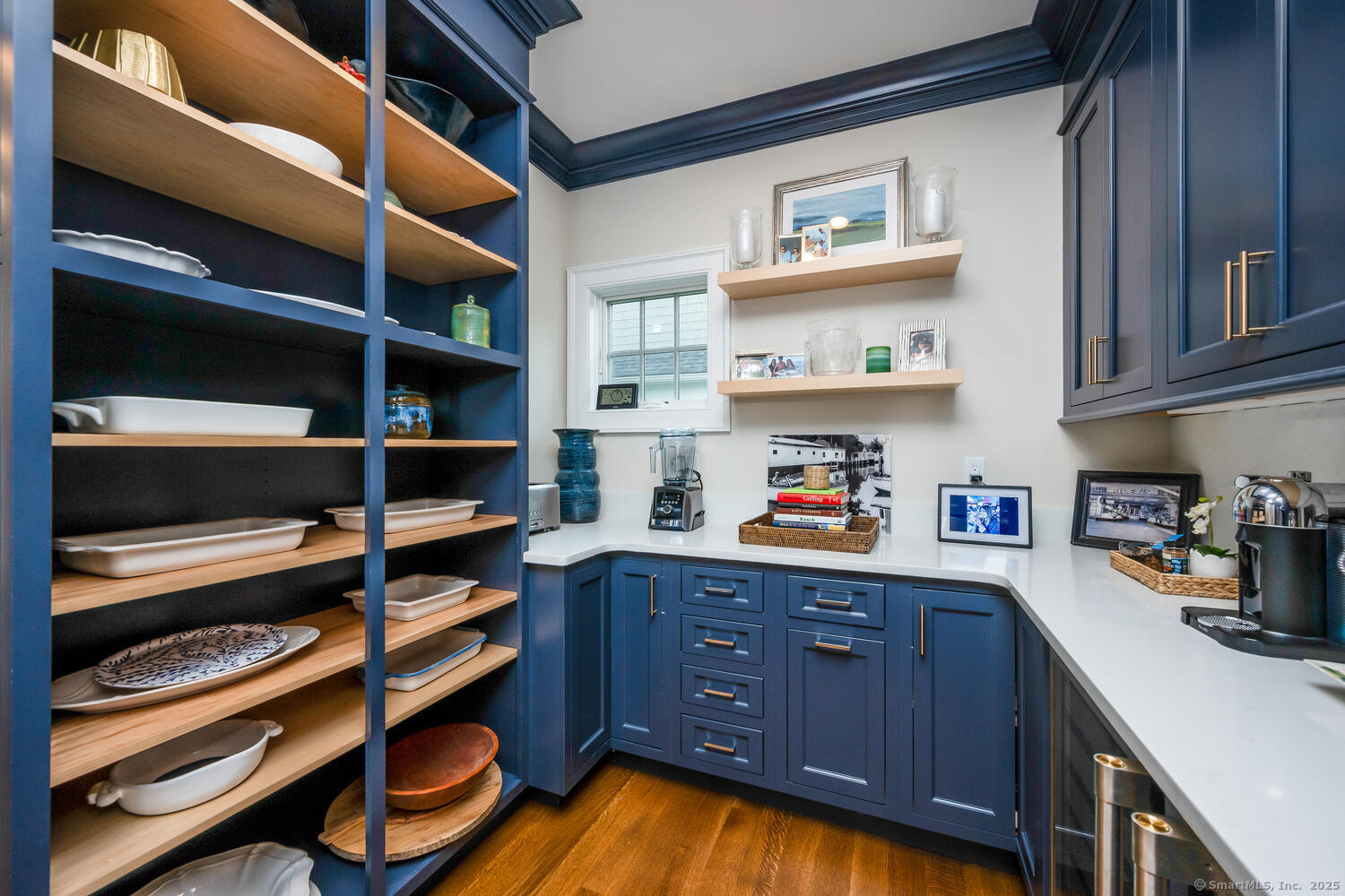 333 West Avenue, Unit 3 Darien, CT 06820 - Photo 16 of 38 a kitchen with cabinets and wooden floor