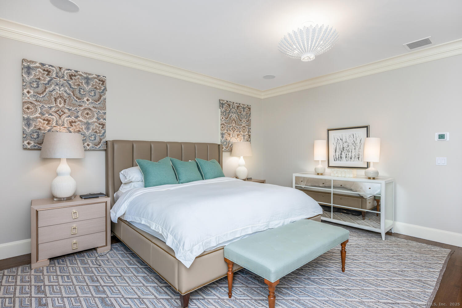 333 West Avenue, Unit 3 Darien, CT 06820 - Photo 18 of 38 a bedroom with a bed and a lamp on table