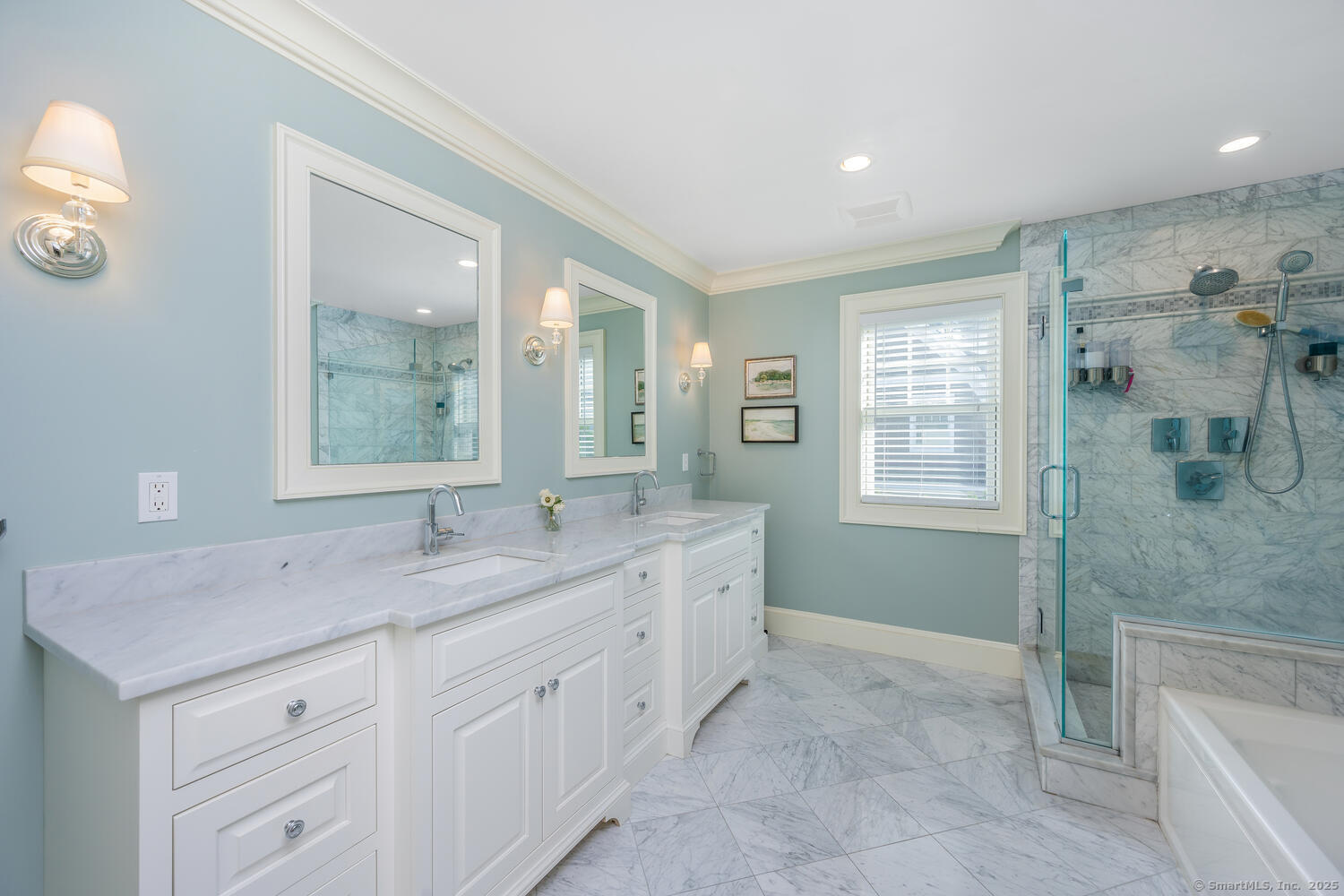 333 West Avenue, Unit 3 Darien, CT 06820 - Photo 21 of 38 a spacious bathroom with a granite countertop sink a mirror and a bathtub