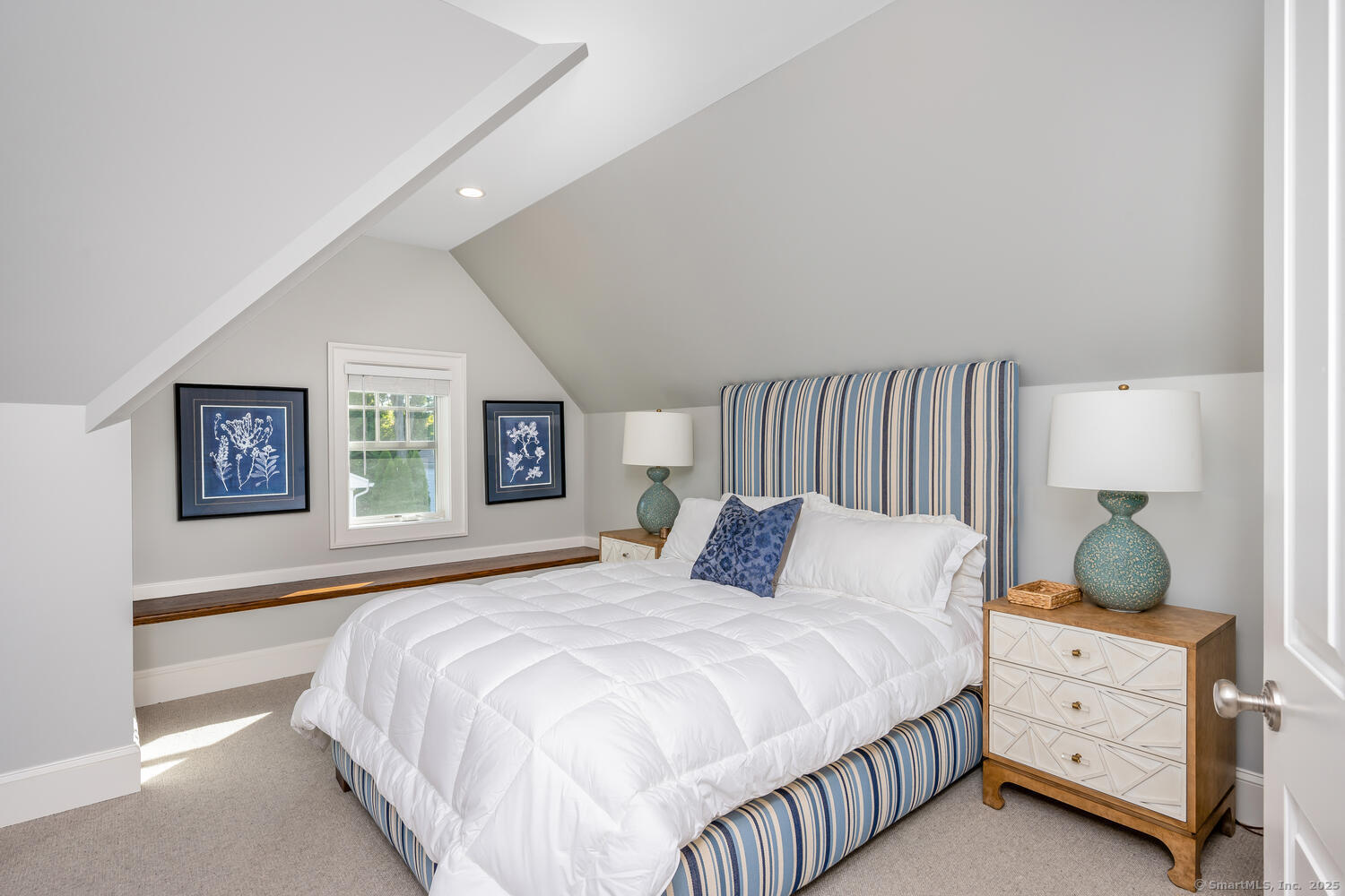 333 West Avenue, Unit 3 Darien, CT 06820 - Photo 27 of 38 a bedroom with a bed and a window