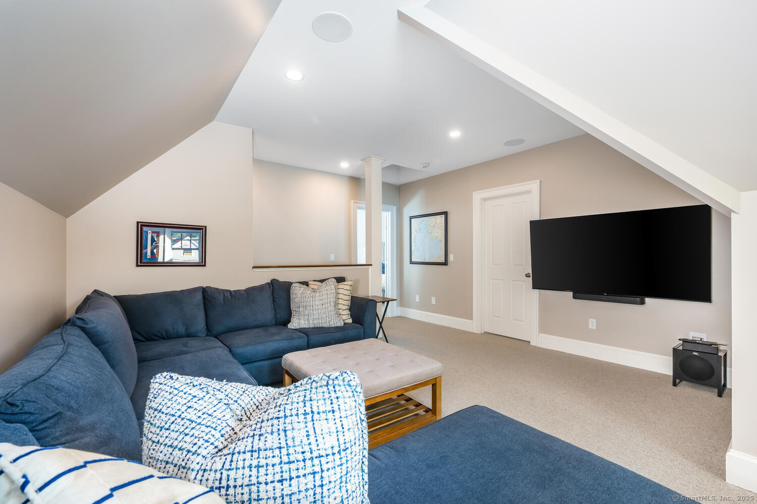 333 West Avenue, Unit 3 Darien, CT 06820 - Photo 29 of 38 a living room with furniture and a flat screen tv