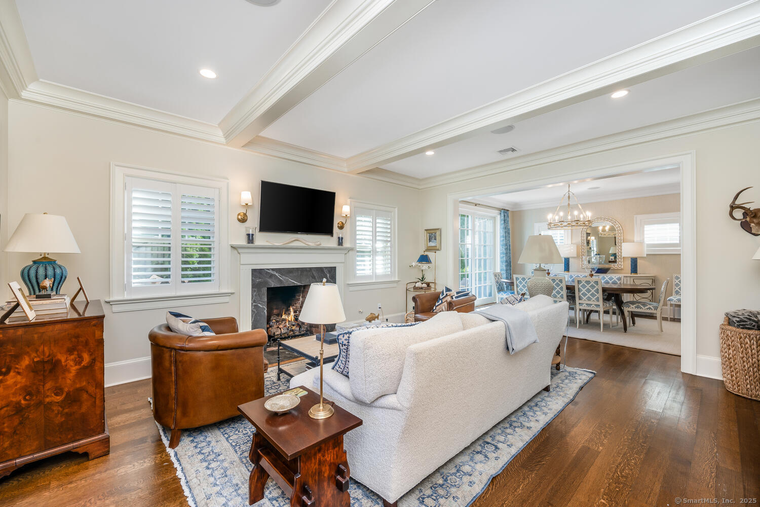 333 West Avenue, Unit 3 Darien, CT 06820 - Photo 3 of 38 a living room with furniture fireplace and a flat screen tv