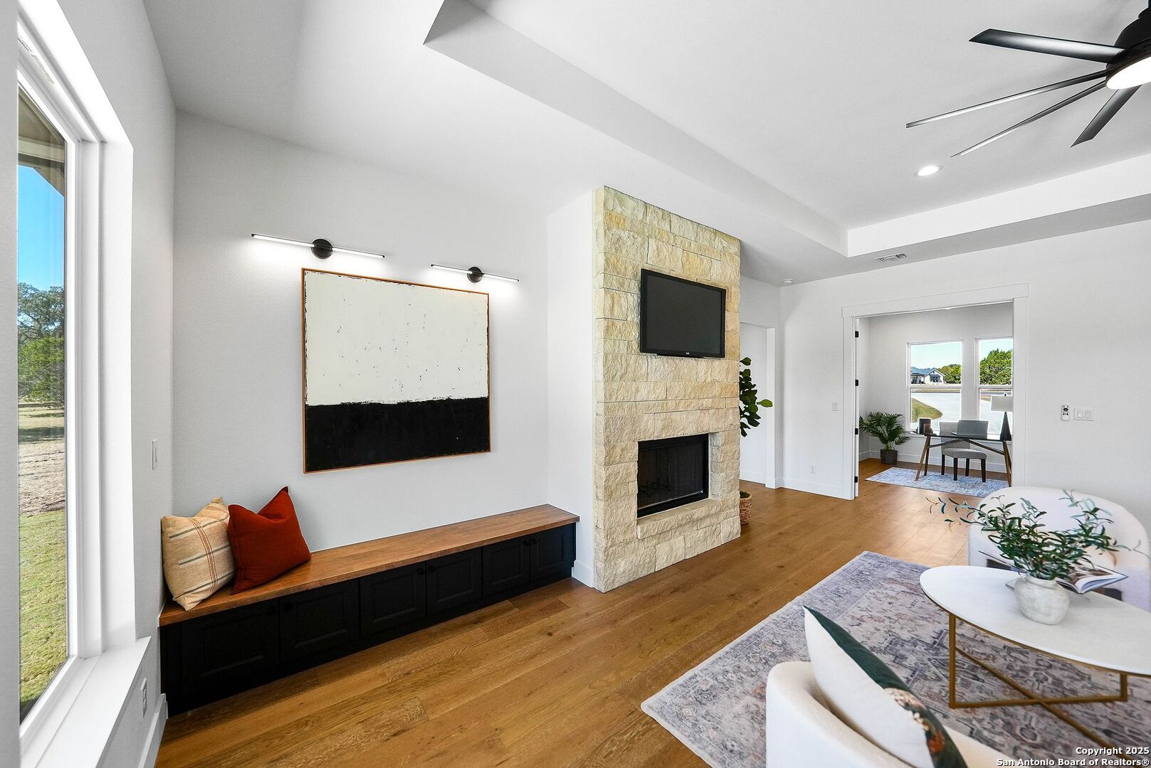 414 Rio Azul Drive Pipe Creek, TX 78063 - Photo 14 of 51 a living room with furniture and a fireplace