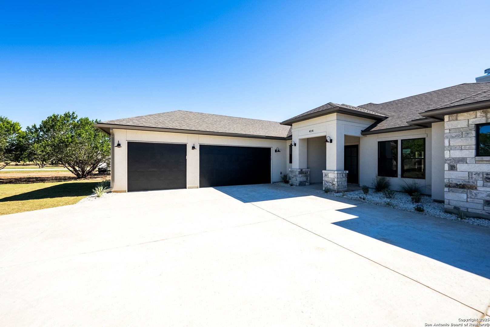 414 Rio Azul Drive Pipe Creek, TX 78063 - Photo 2 of 51 a house view with a outdoor space