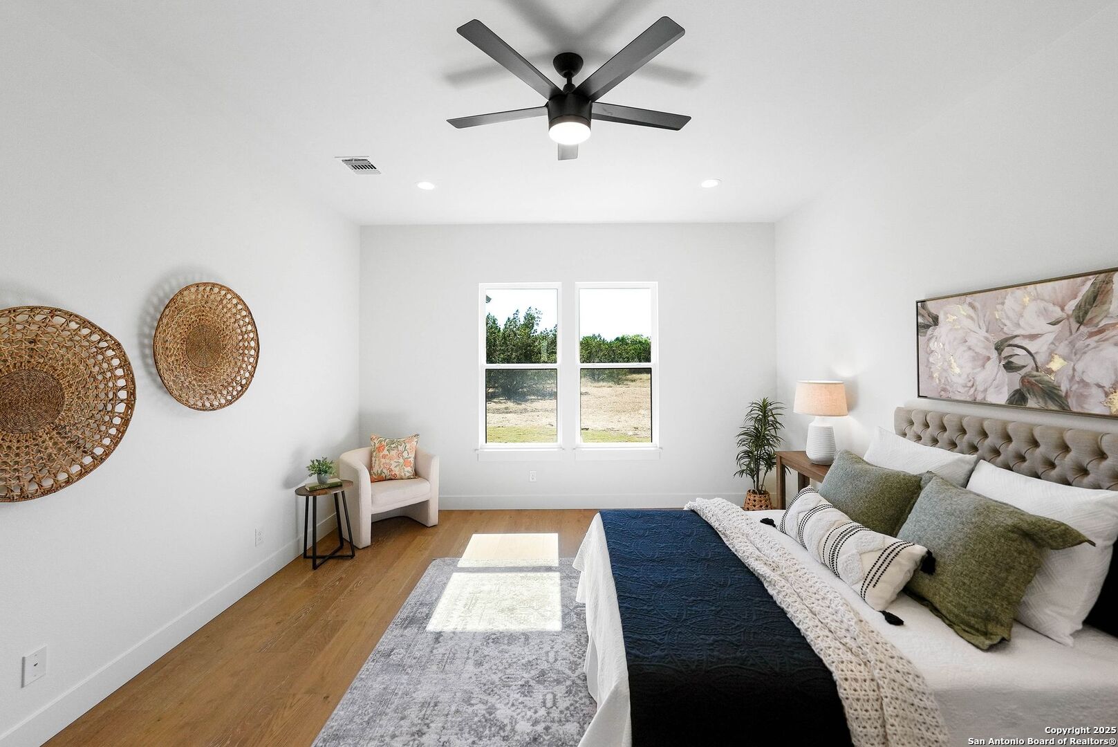 414 Rio Azul Drive Pipe Creek, TX 78063 - Photo 22 of 51 a living room with furniture and a large window