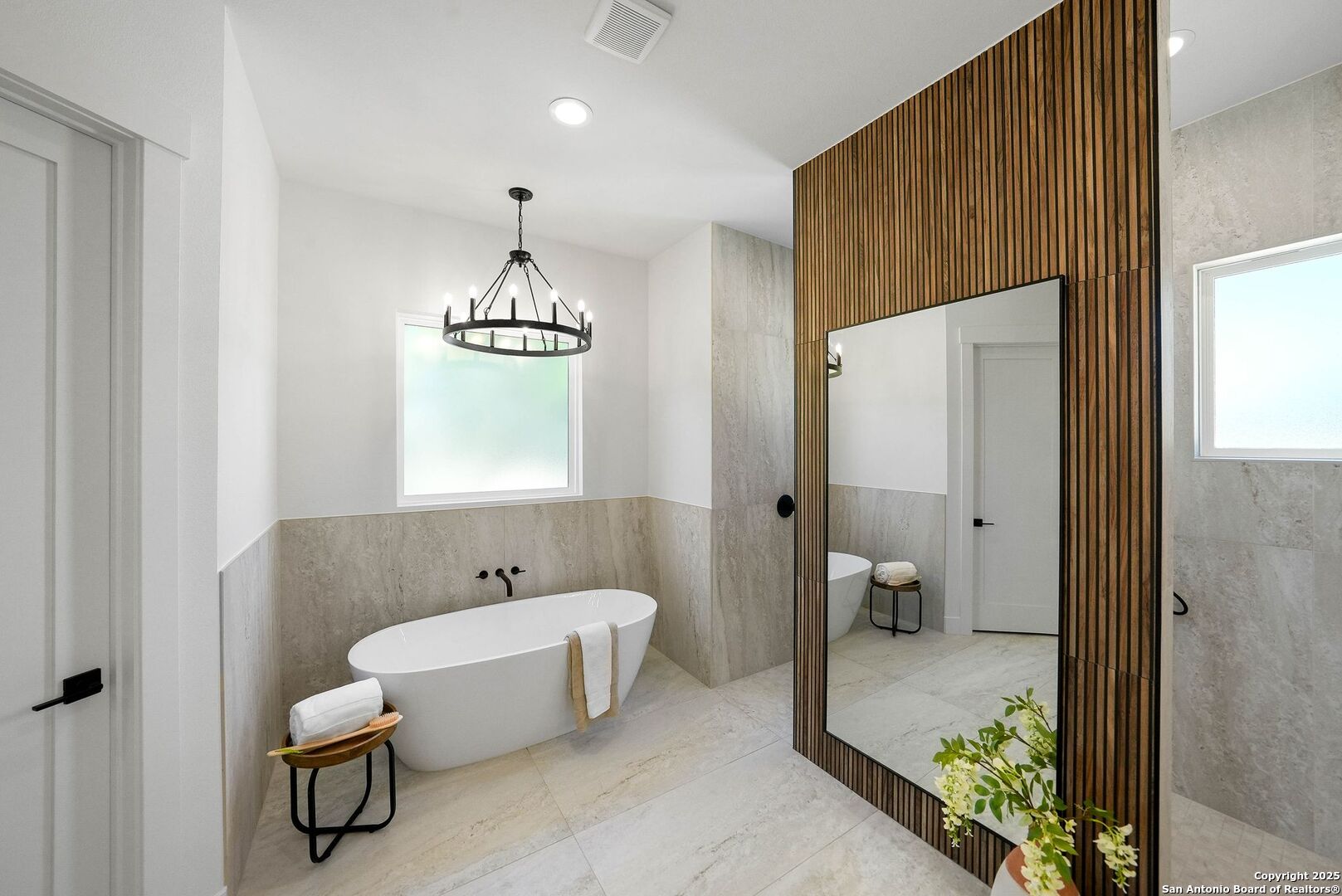 414 Rio Azul Drive Pipe Creek, TX 78063 - Photo 24 of 51 a spacious bathroom with a bathtub and a window