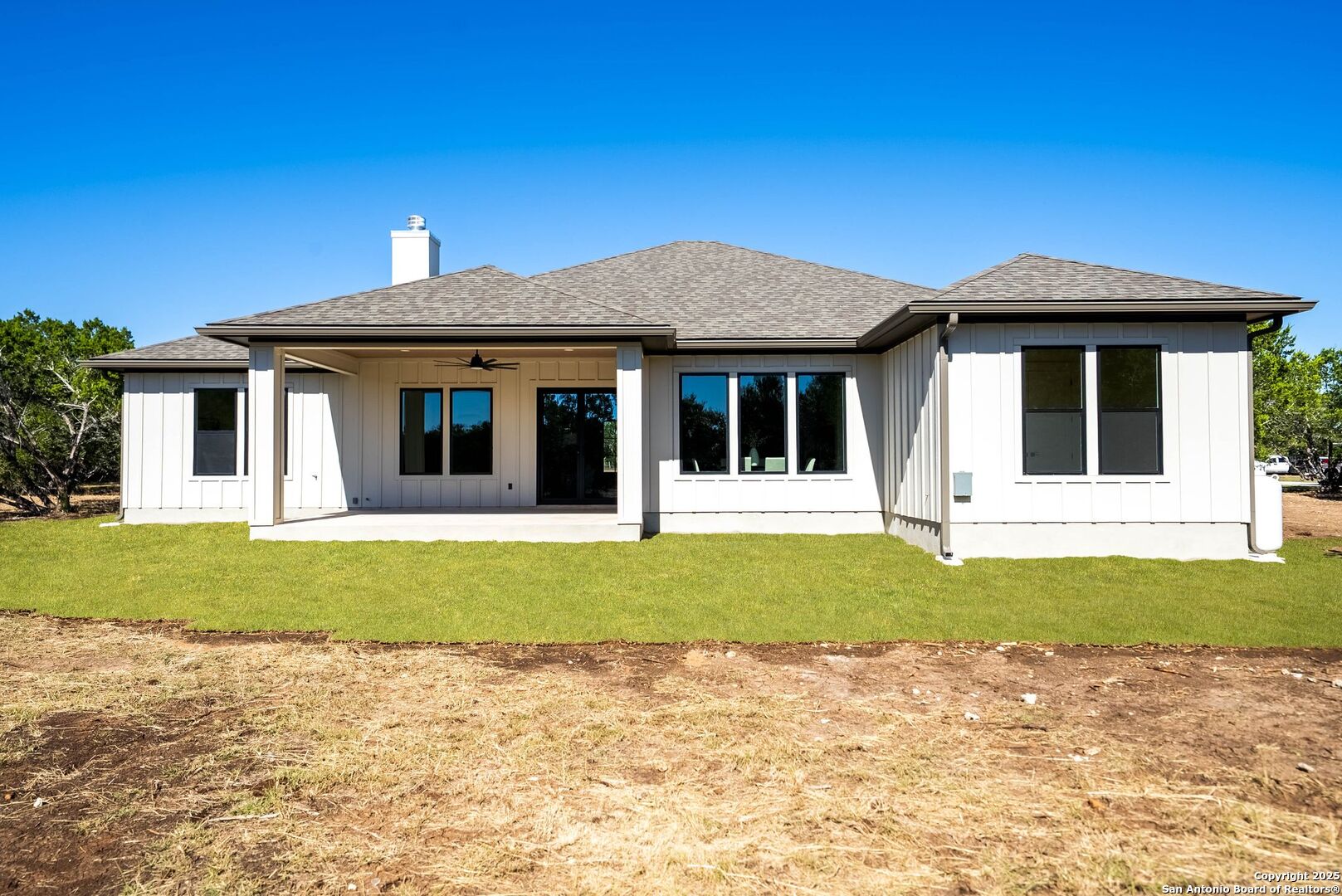 414 Rio Azul Drive Pipe Creek, TX 78063 - Photo 48 of 51 a house with trees in the background