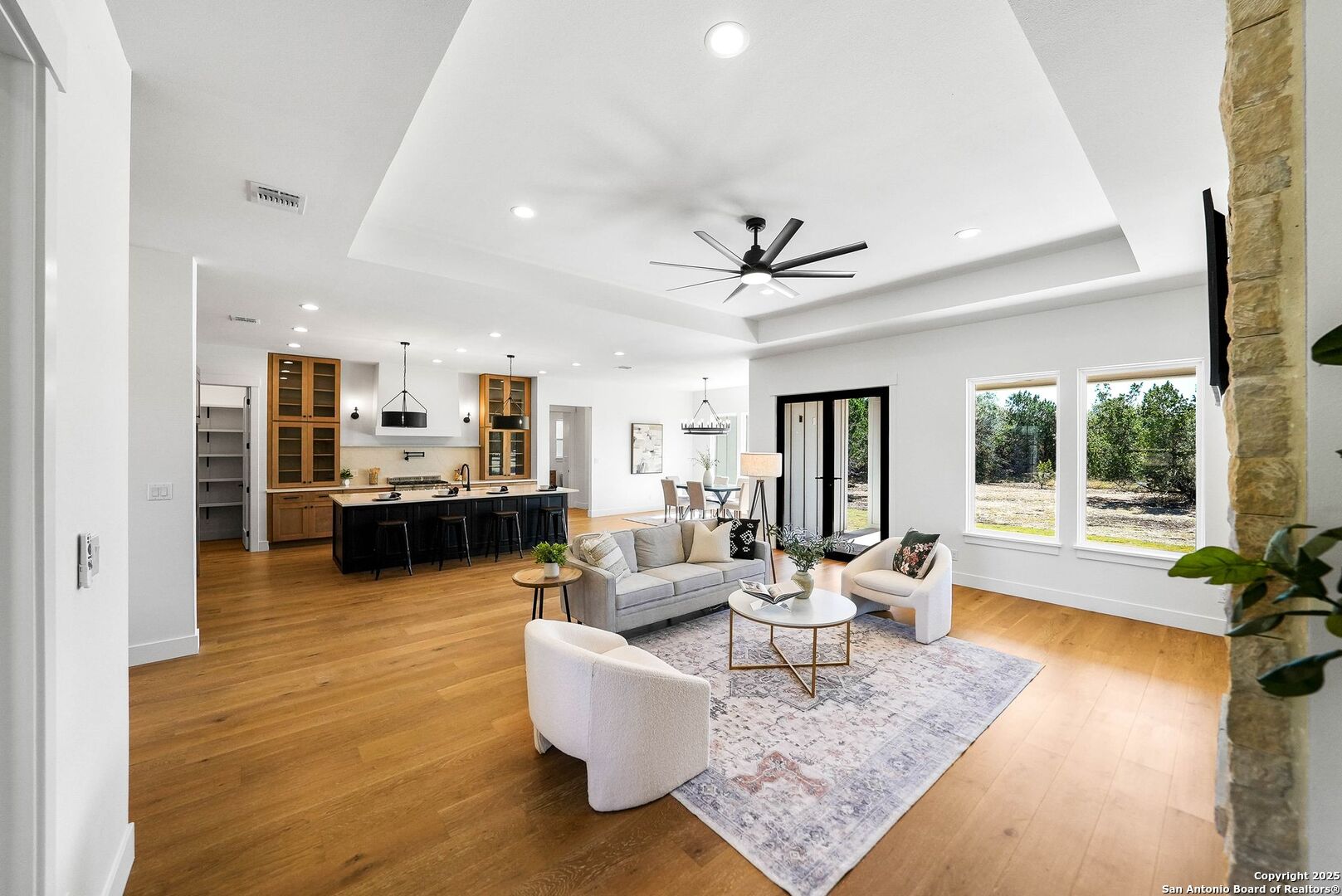 414 Rio Azul Drive Pipe Creek, TX 78063 - Photo 5 of 51 a living room with furniture and a large window