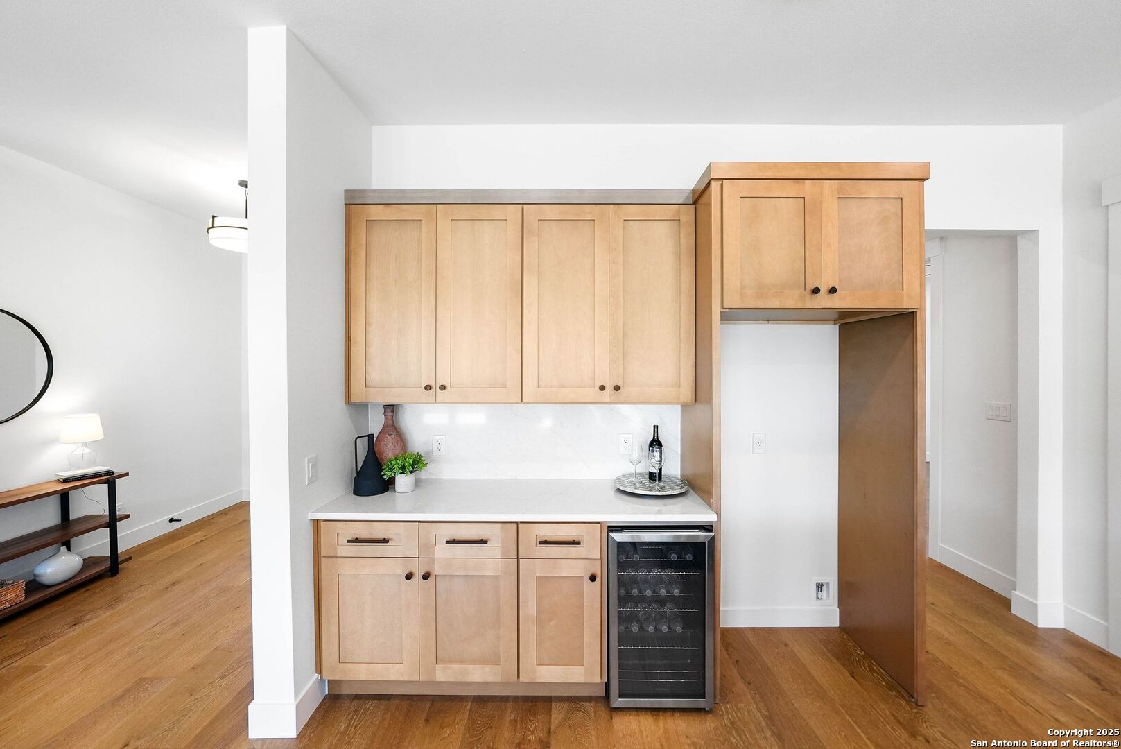 414 Rio Azul Drive Pipe Creek, TX 78063 - Photo 10 of 51 an entryway with wooden floor and cabinets