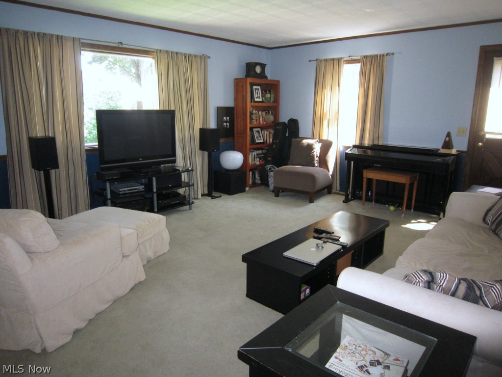 First floor family room off the kitchen.  Door shown leads into the back yard.
