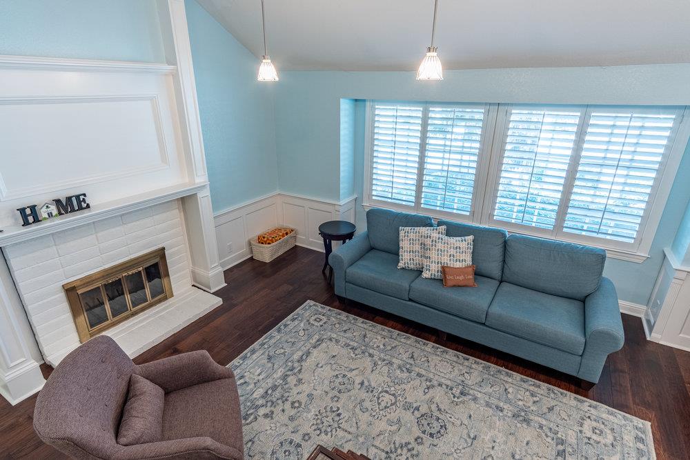8955 Ridgeway Drive Gilroy, CA 95020 - Photo 24 of 64 a living room with furniture and a fireplace