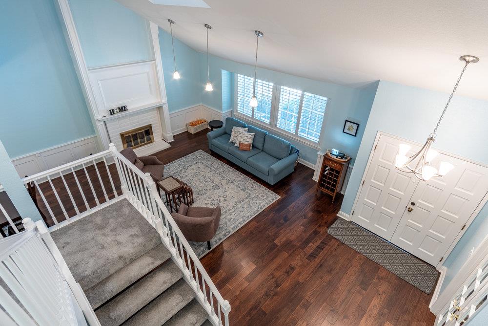 8955 Ridgeway Drive Gilroy, CA 95020 - Photo 25 of 64 a living room with furniture and a wooden floor