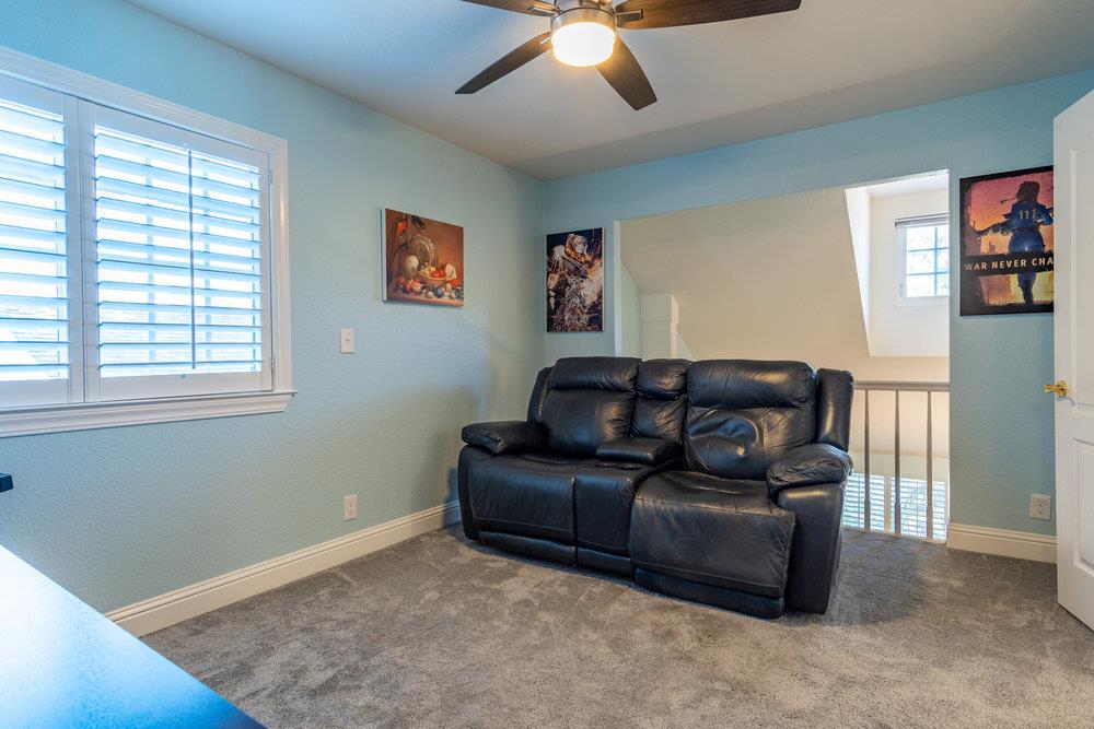 8955 Ridgeway Drive Gilroy, CA 95020 - Photo 35 of 64 a living room with furniture and a window