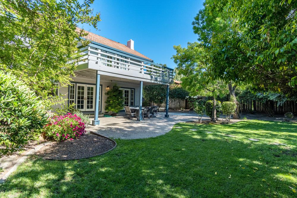 8955 Ridgeway Drive Gilroy, CA 95020 - Photo 43 of 64 a view of a house with backyard and sitting area