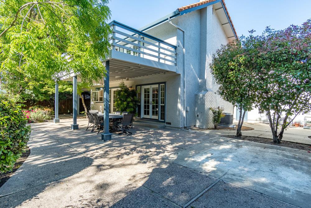 8955 Ridgeway Drive Gilroy, CA 95020 - Photo 46 of 64 a view of a house with backyard porch and sitting area
