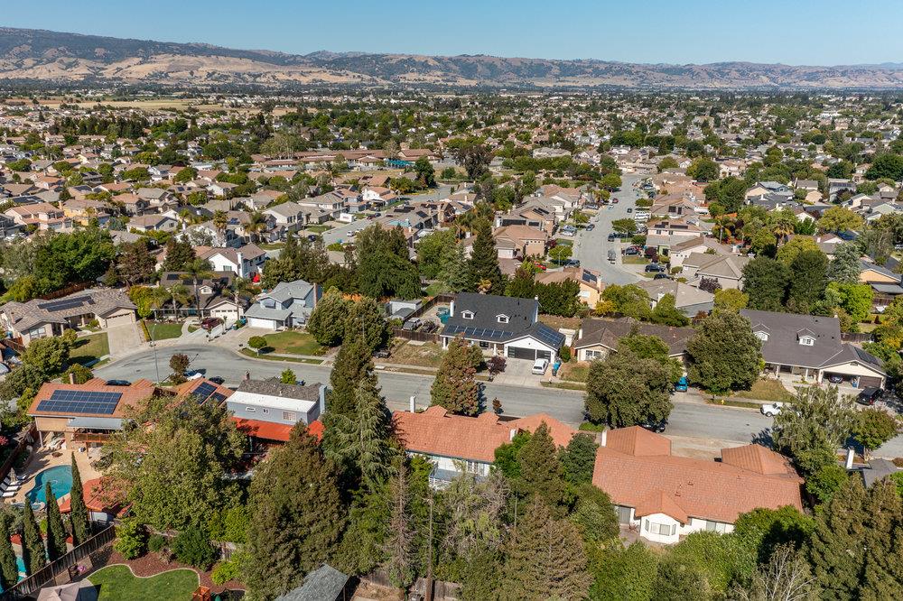 8955 Ridgeway Drive Gilroy, CA 95020 - Photo 54 of 64 an aerial view of residential houses with outdoor space and trees