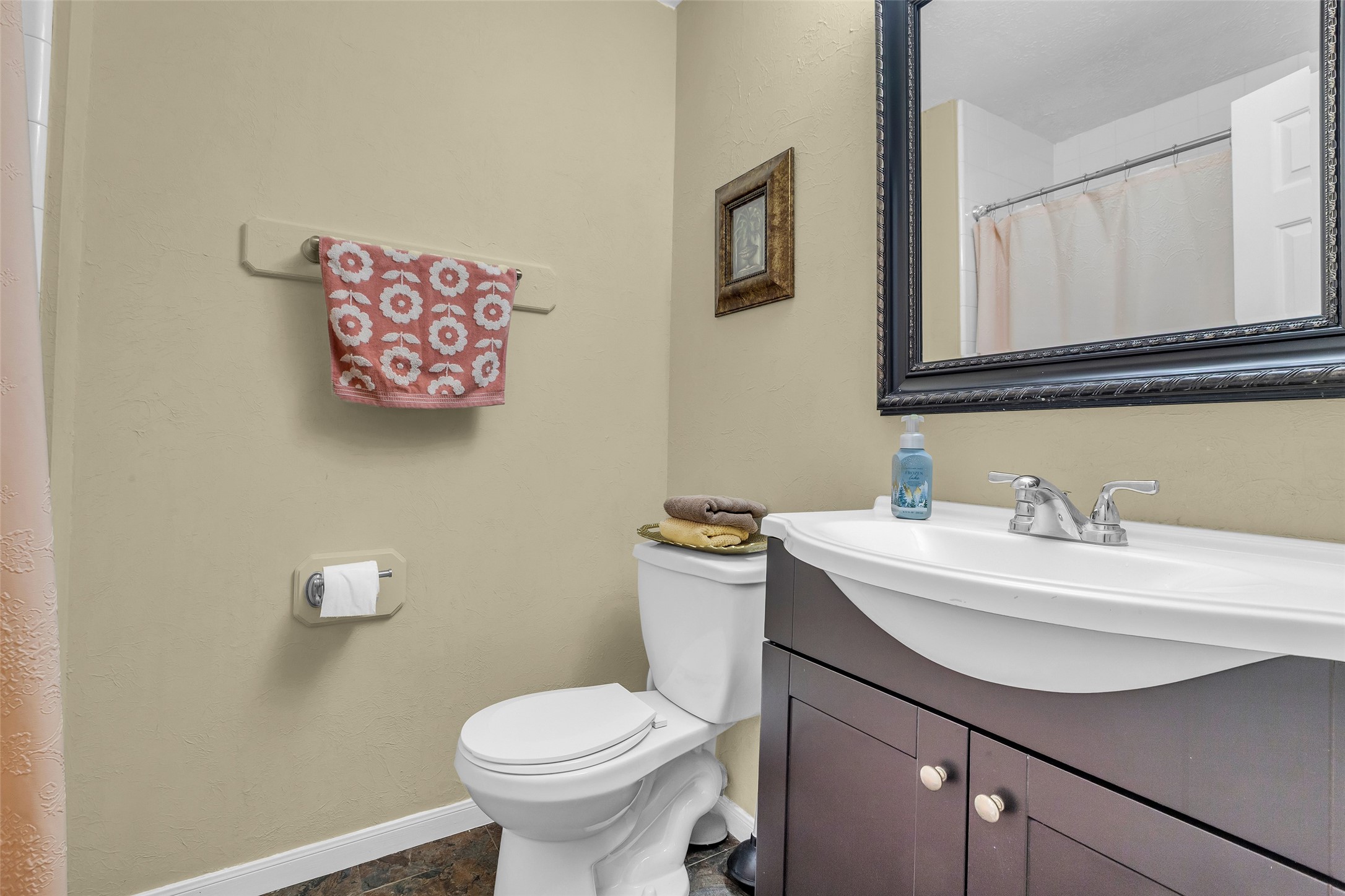 21303 Deerhaven Drive Spring, TX 77388 - Photo 15 of 24 a bathroom with a sink mirror and toilet