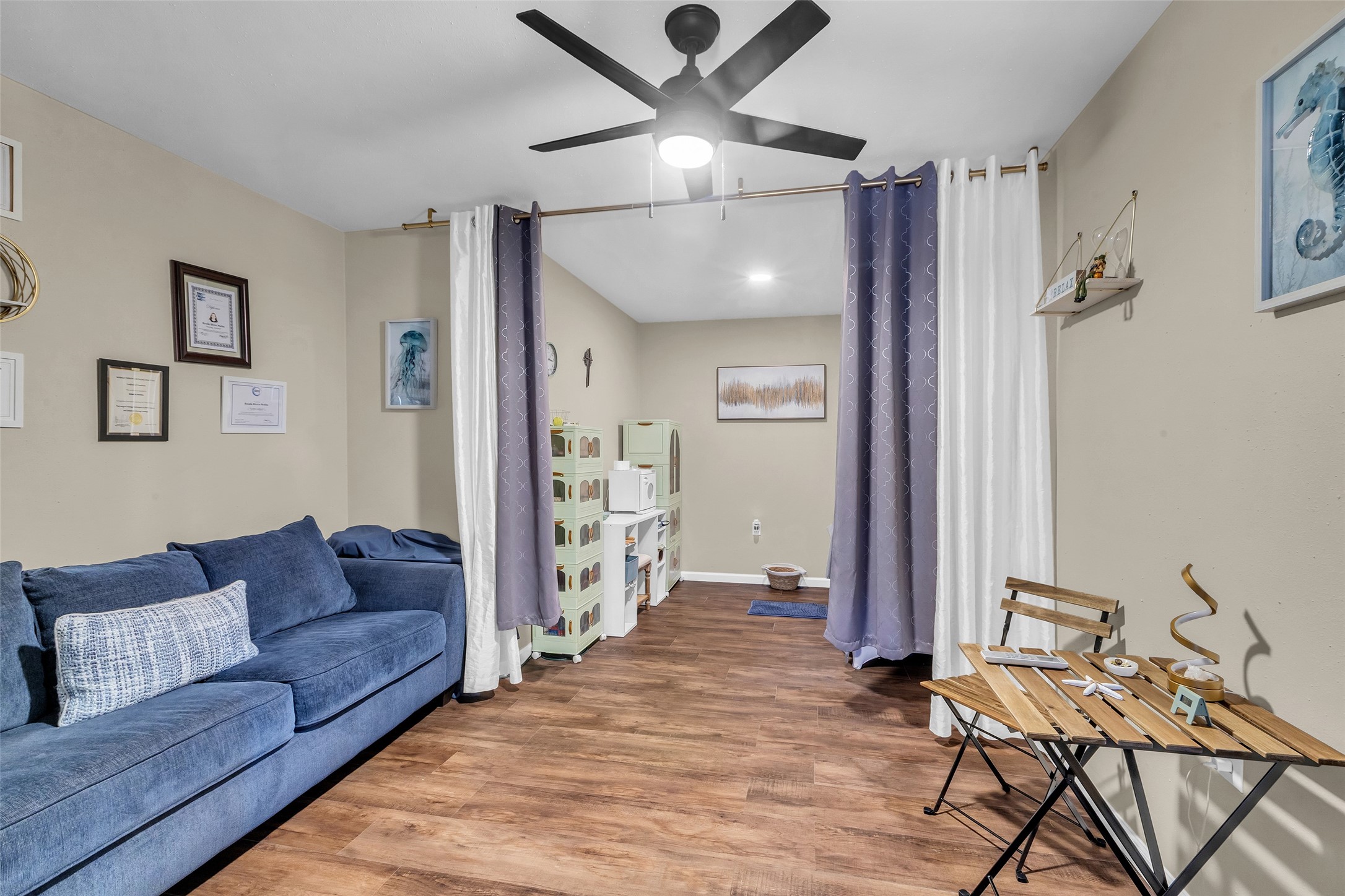 21303 Deerhaven Drive Spring, TX 77388 - Photo 20 of 24 a living room with furniture and a wooden floor