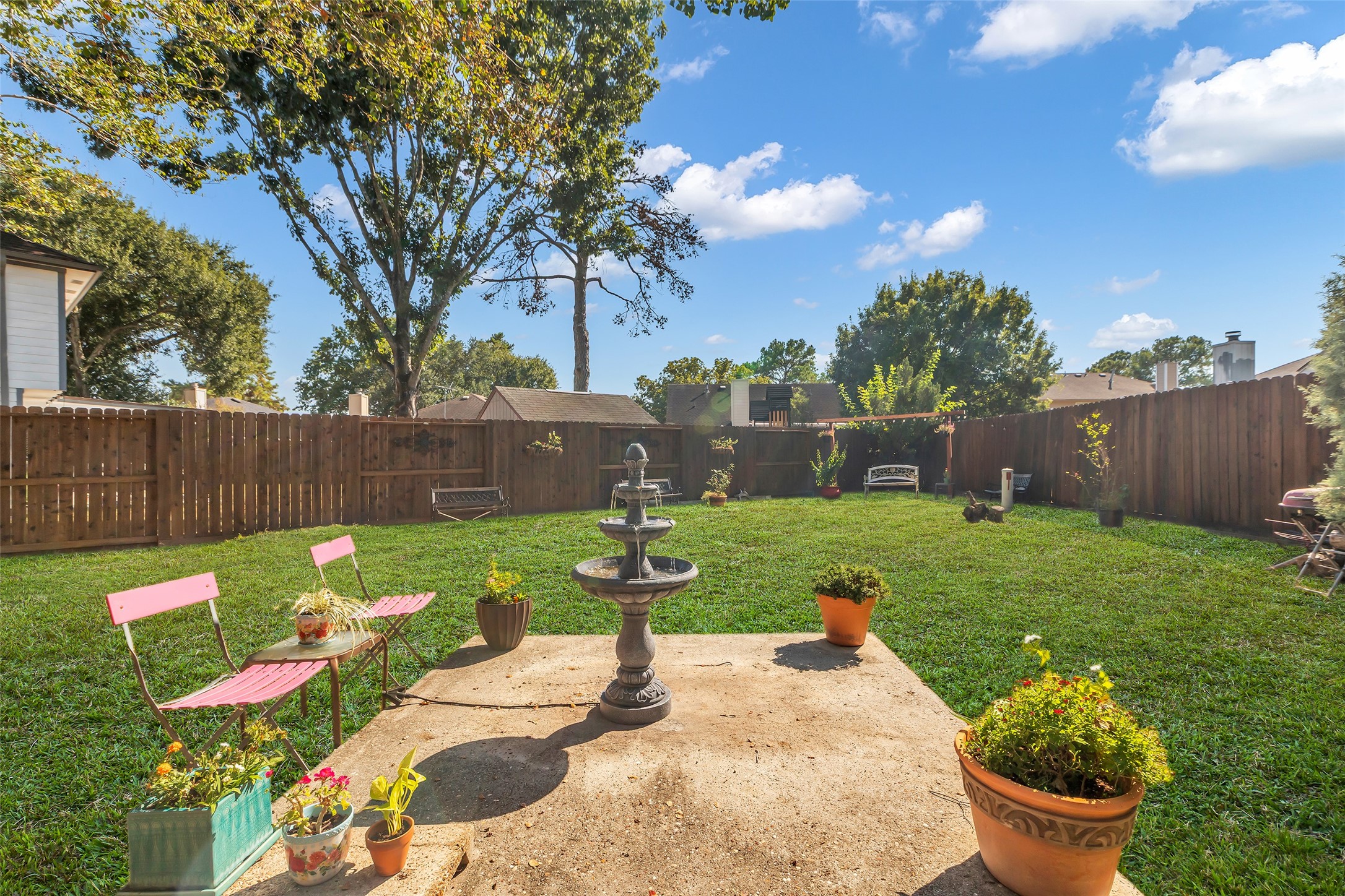 21303 Deerhaven Drive Spring, TX 77388 - Photo 22 of 24 a view of a backyard with wooden fence
