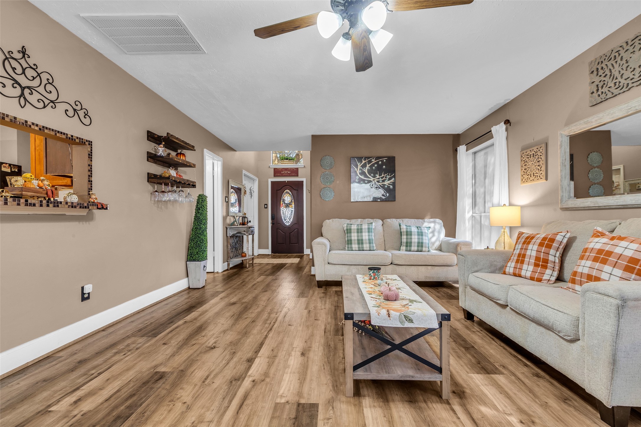 21303 Deerhaven Drive Spring, TX 77388 - Photo 3 of 24 a living room with furniture and wooden floor
