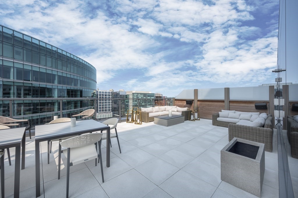 133 Seaport Boulevard, Unit 823 Boston, MA 02210 - Photo 20 of 30 a view of a terrace with sitting area