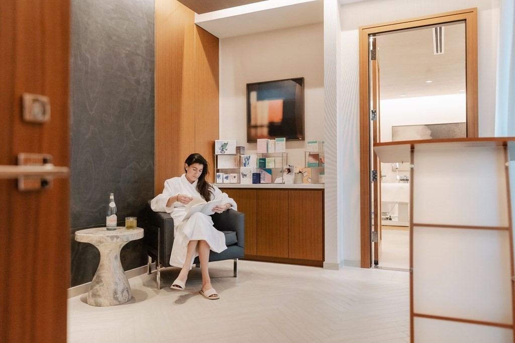 133 Seaport Boulevard, Unit 823 Boston, MA 02210 - Photo 22 of 30 a bathroom with a sink mirror and a window