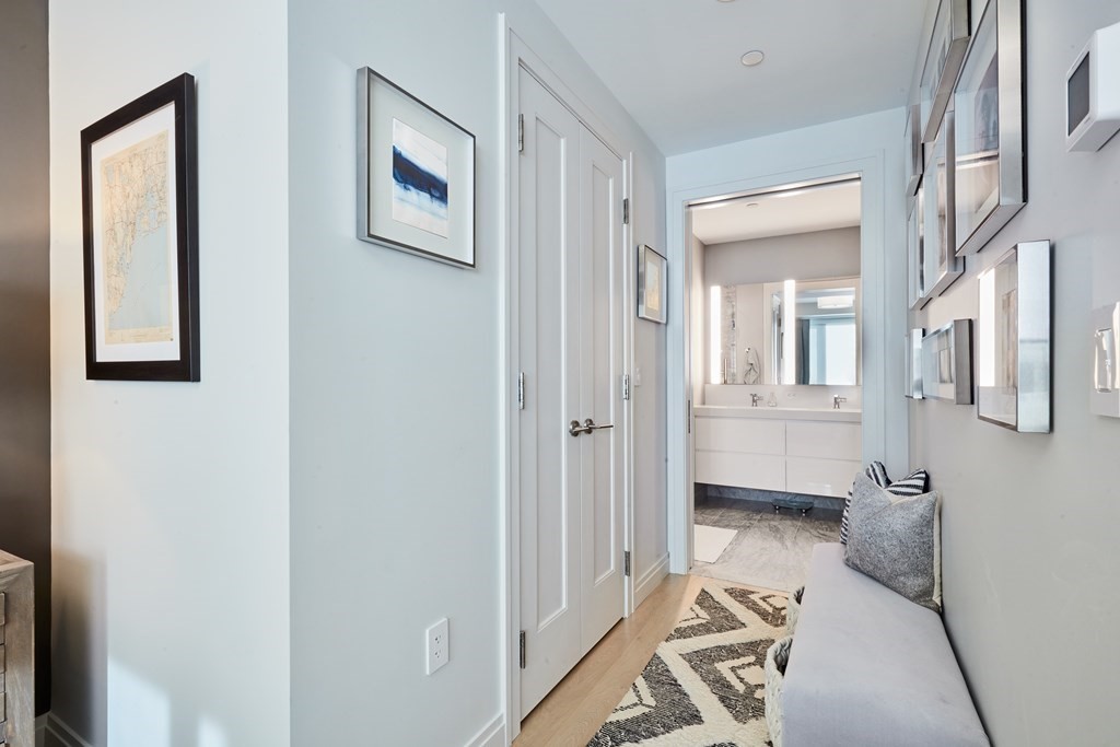 133 Seaport Boulevard, Unit 823 Boston, MA 02210 - Photo 9 of 30 a bathroom with a bathtub and a toilet