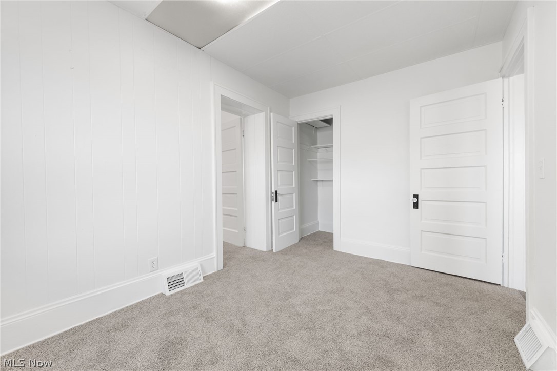 2140 Broadview Road Cleveland, OH 44109 - Photo 17 of 42 Bedroom with light carpet and a closet