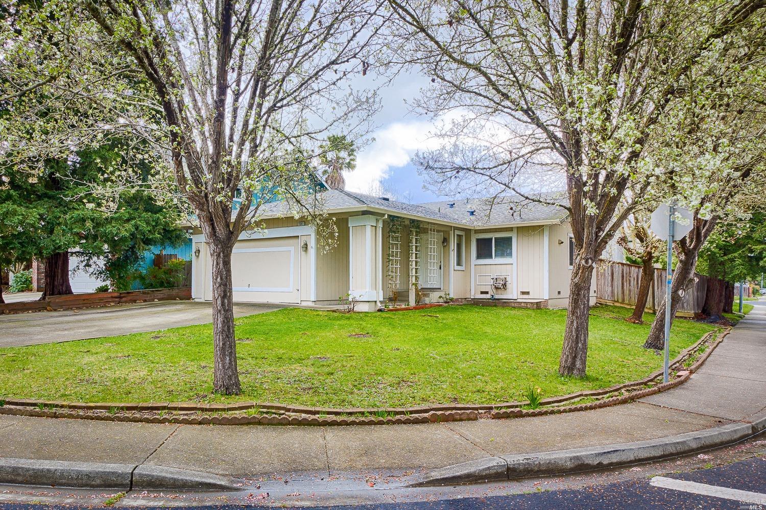 1541 Golf Course Drive Rohnert Park, CA 94928 - Photo 1 of 1 a front view of a house with a yard